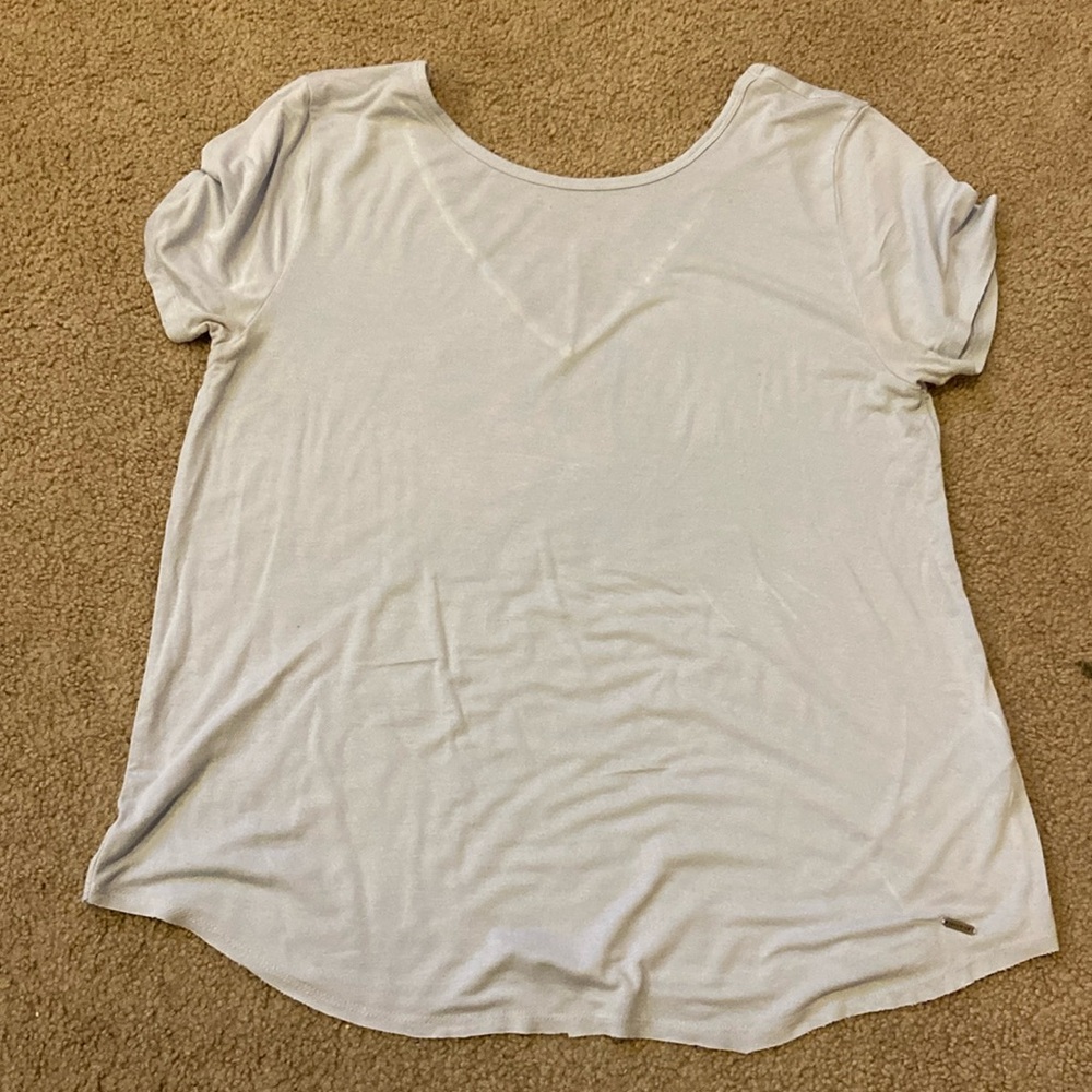 Blue Hollister t-shirt with lace on the back
Size: L